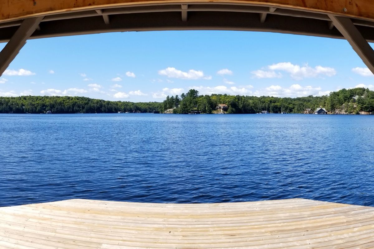 Lake Rosseau, Muskoka, seen from a covered dock at Rosseau Waterfront Park.