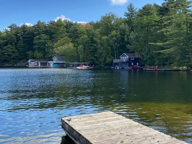 Boathouses and a dock on a Muskoka lake near Port Carling, Ontario.